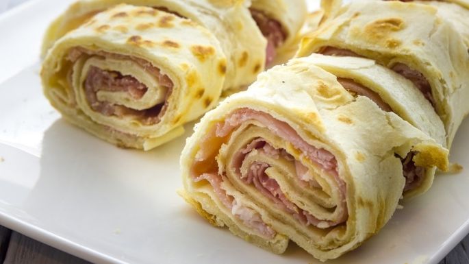 Date un gustito a la hora de la cena con estos ricos burritos de jamón y queso